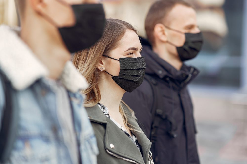 people-in-masks-stands-on-the-street