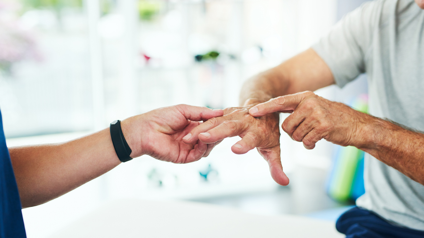 Cropped shot of an unrecognizable male physiotherapist doing a consultation and assessment with a senior patient